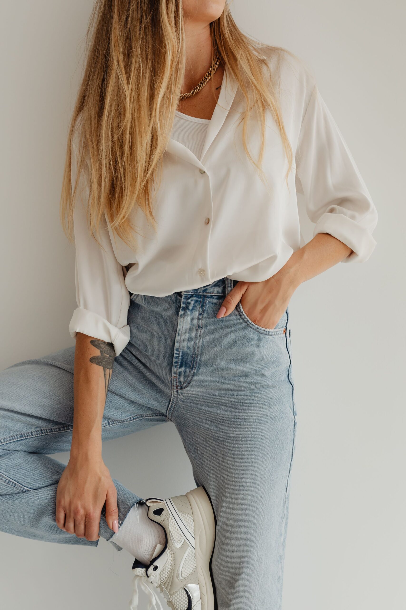 kaboompics_light-blue-jeans-white-silk-shirt-27721